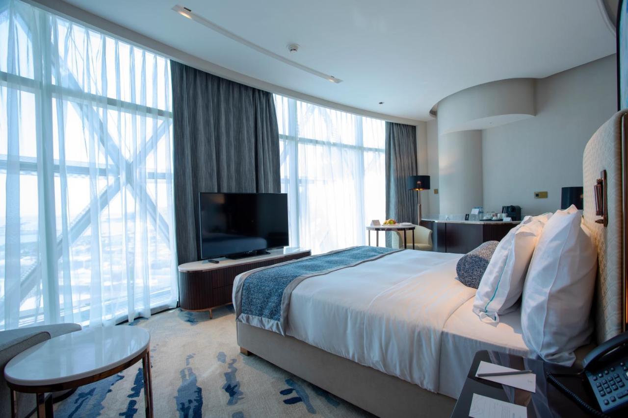 Century Marina Hotel - Lusail מראה חיצוני תמונה A bedroom at the hotel