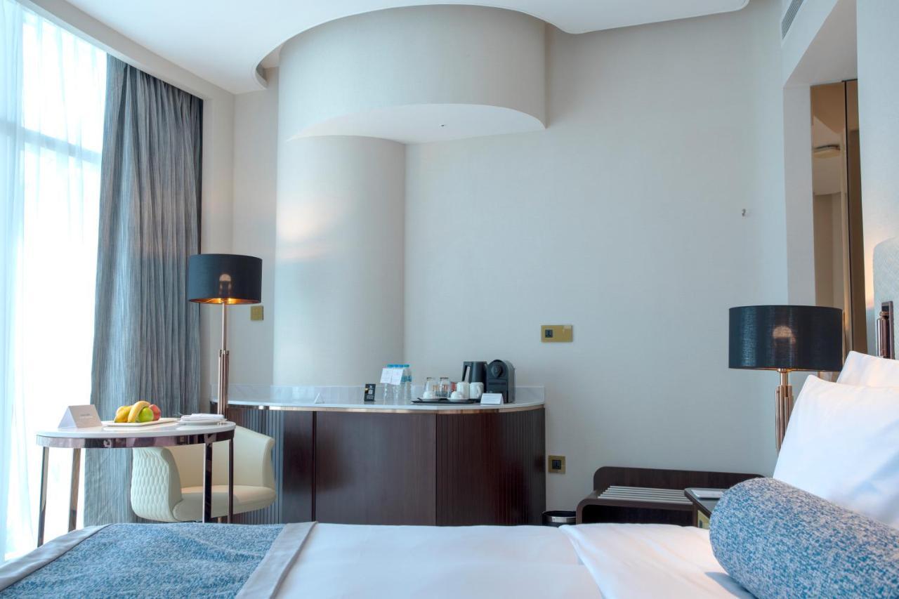 Century Marina Hotel - Lusail מראה חיצוני תמונה A room at the hotel