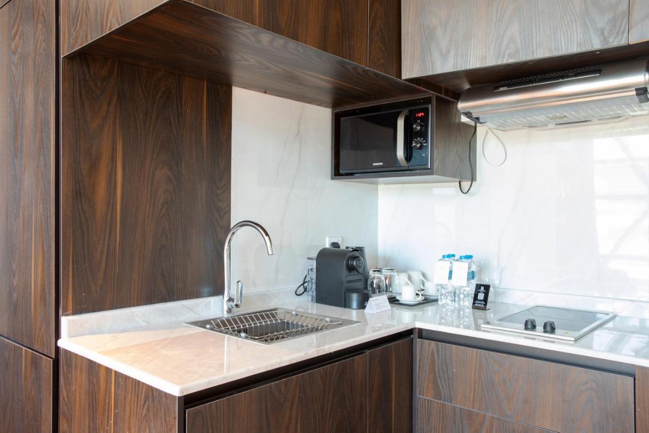 Century Marina Hotel - Lusail מראה חיצוני תמונה A kitchen in a hotel