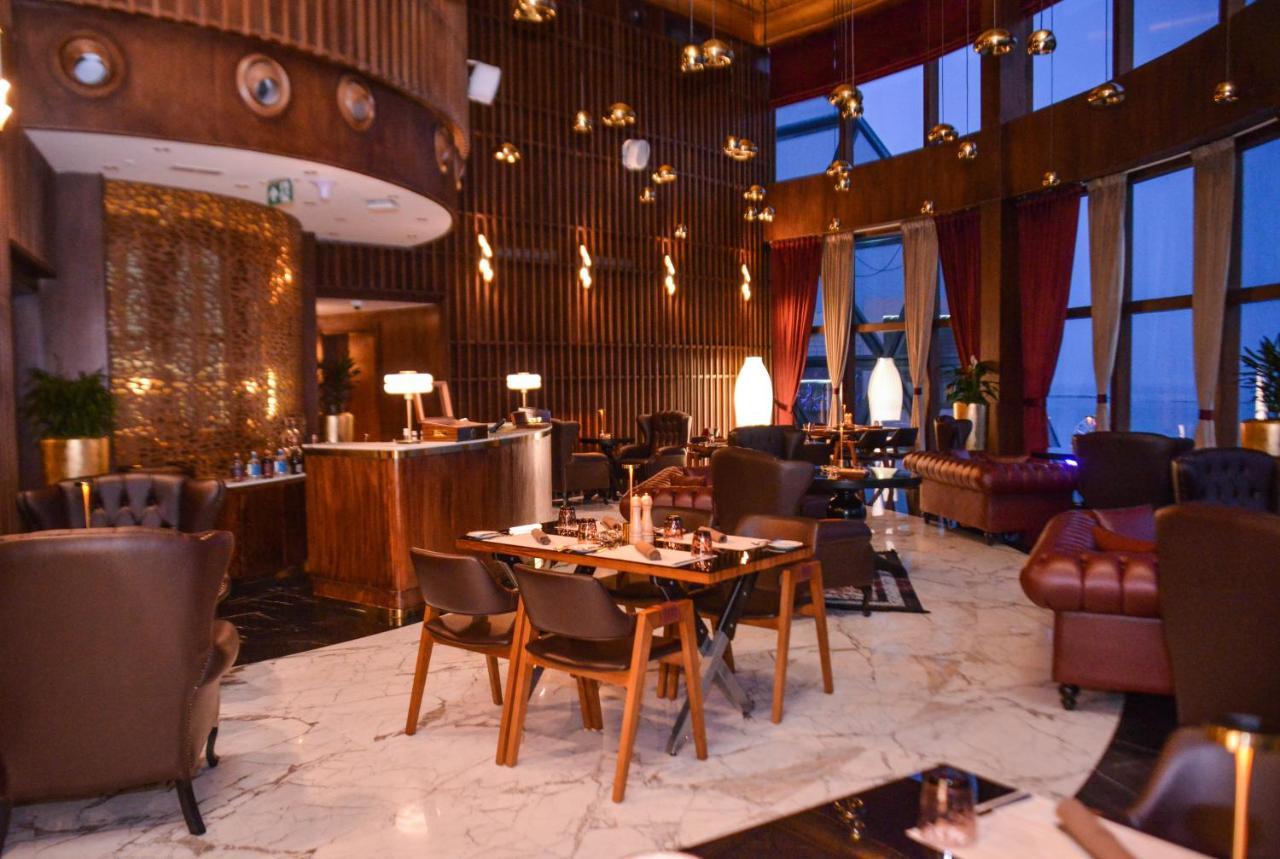 Century Marina Hotel - Lusail מראה חיצוני תמונה The restaurant